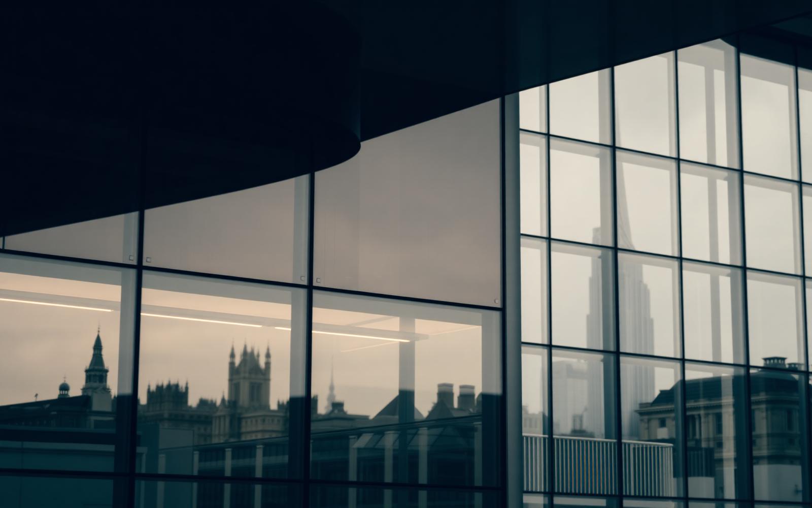 The stone and glass facade of a UK commercial office building